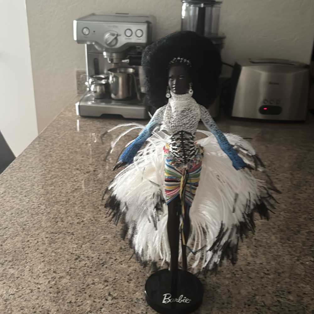 beautiful black Barbie in White and Blue Feathered Ensemble